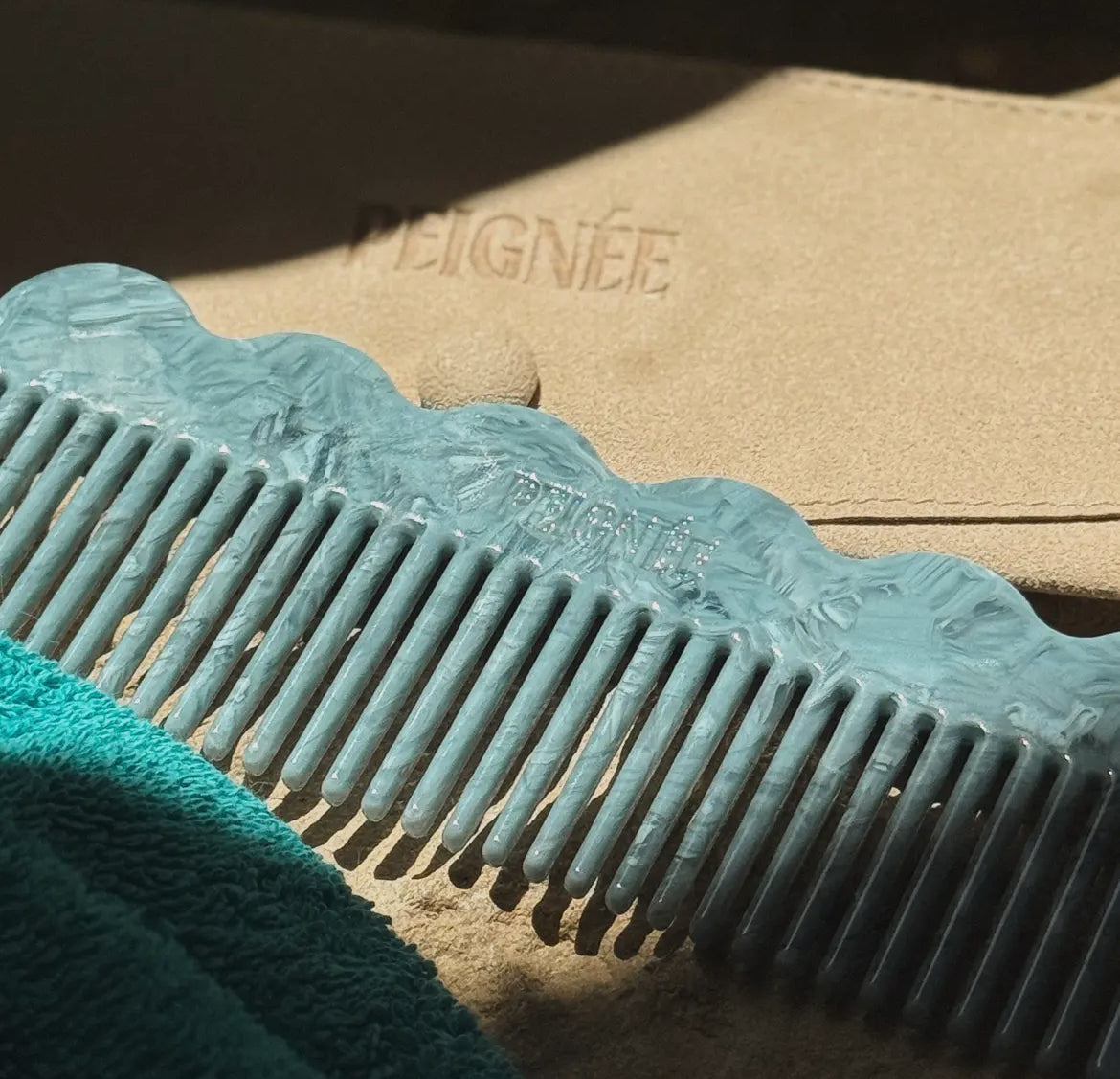 PETTINE FIRMATO PEIGNÉE - AQUA