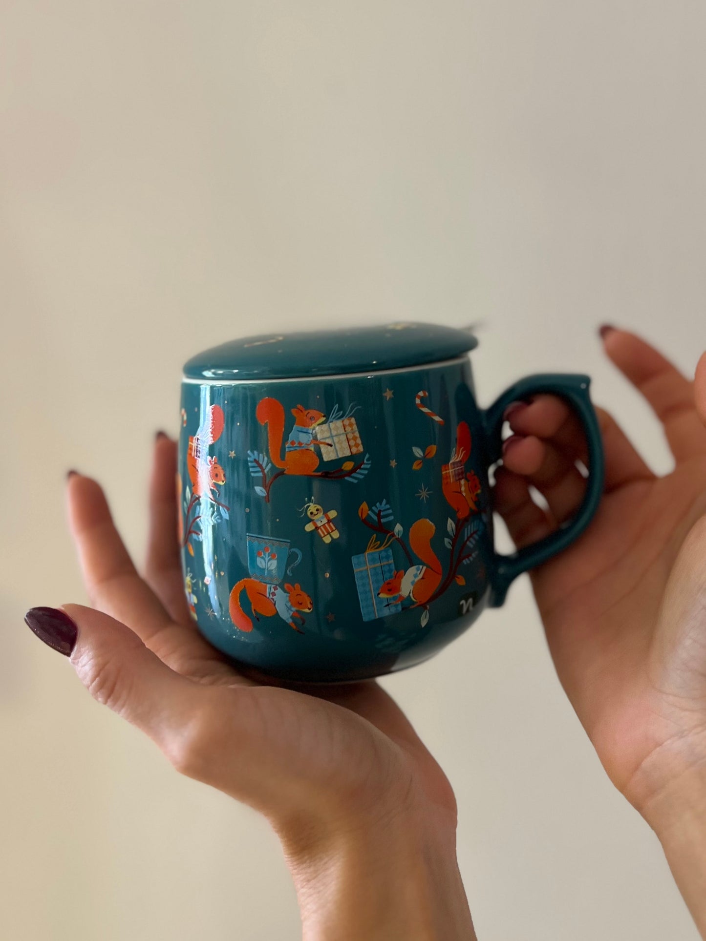 INFUSIERA IN CERAMICA "SCOIATTOLINI DI NATALE"